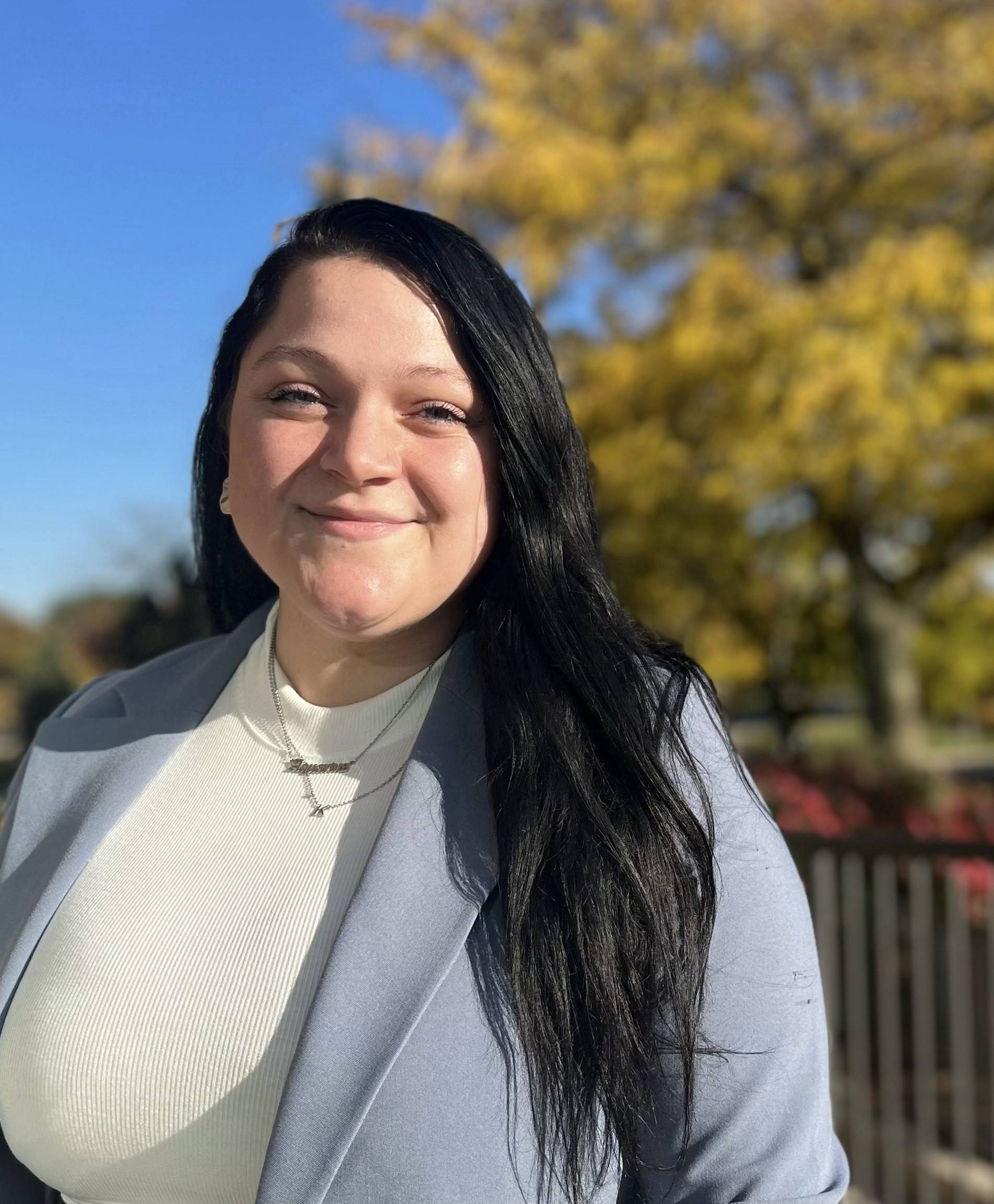 Staff Member, Kel Nemetz, smiling in in headshot